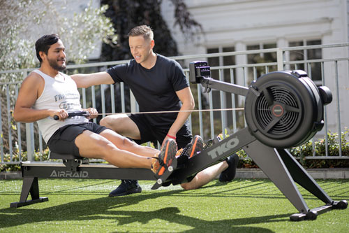 Coaching a rowing session outdoors